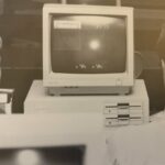 Two LBC students play a computer game in the computer lab during the 1988-89 academic year. Anyone have a floppy disk?