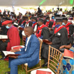 41 Graduates celebrating in Uganda.