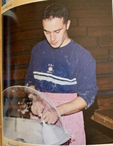 A student helps make cotton candy during the 2000-01 academic year.