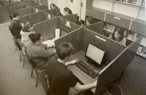By the 2005-06 academic year, computers had gotten an upgrade in the library, as students do their work.