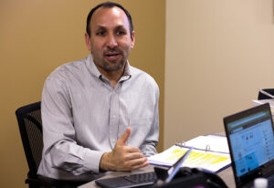 Dr. Kevin Gushiken teaches a PhD in Leadership class.