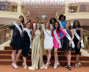 Kayla Willing ('25) stands with other title holders in Maryland.