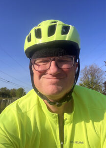 Dr. Mark Draper safely takes a selfie while biking to the Charles & Gloria Jones Library on LBC's main campus.