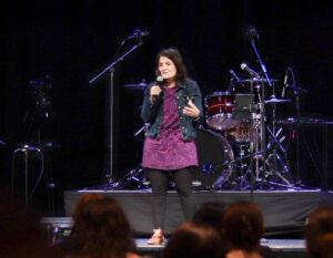 Stroopies co-owner Jennie Groff speaks to LBC students in chapel in March 2024.