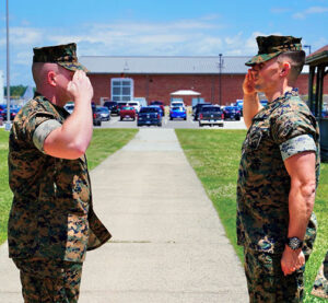 chaplain salutes officer