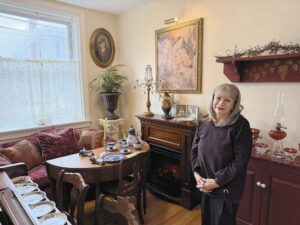 LBC alumna Stephanie (Lutz '12) Schaefer in the former drawing room at 40 W. High St. / Photo from Elizabethtown Merchandiser