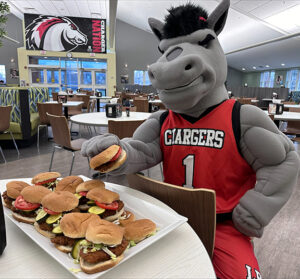 LBC's mascot, Bolt, chows down on Chicken Patty Wednesday.