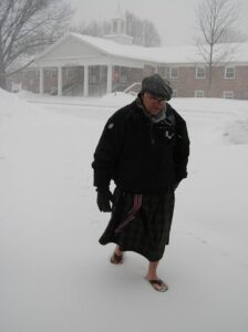 Dr. Ed treks through the snow, in flip-flops of course, to a past Missions Conference session.