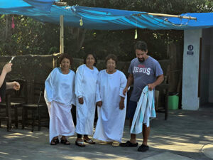 peru journey team group experiences a baptism