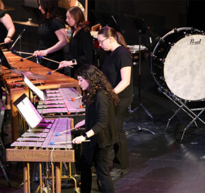 wind and percussion ensemble performs